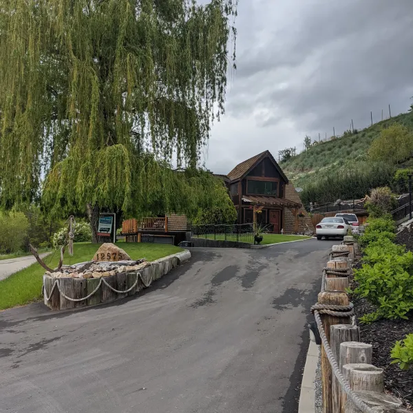 Beautiful North Okanagan Property with large willow in front